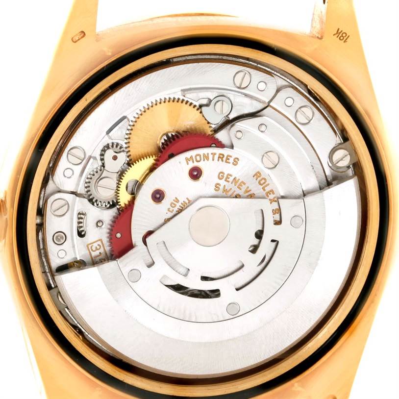 This image shows the internal mechanism of the Rolex President 18308 Men
s Yellow Gold Champagne Dial 18308 Men
s Yellow Gold Champagne Dial model watch, highlighting the gears and moving parts.
