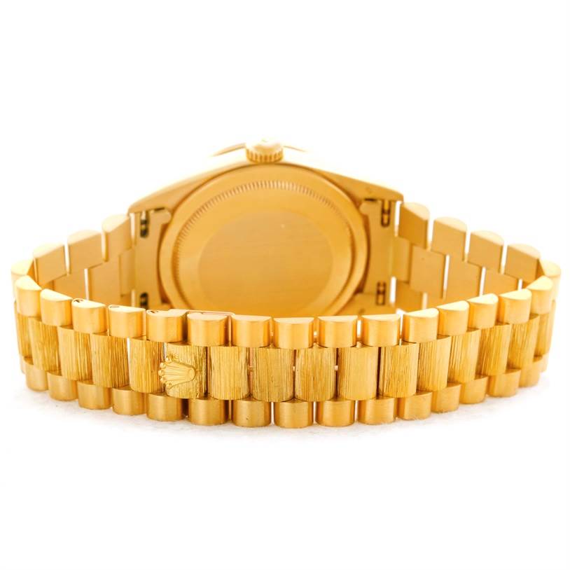 The image shows the backside and bracelet of a Rolex President 18308 Men
s Yellow Gold Champagne Dial 18308 Men
s Yellow Gold Champagne Dial model.