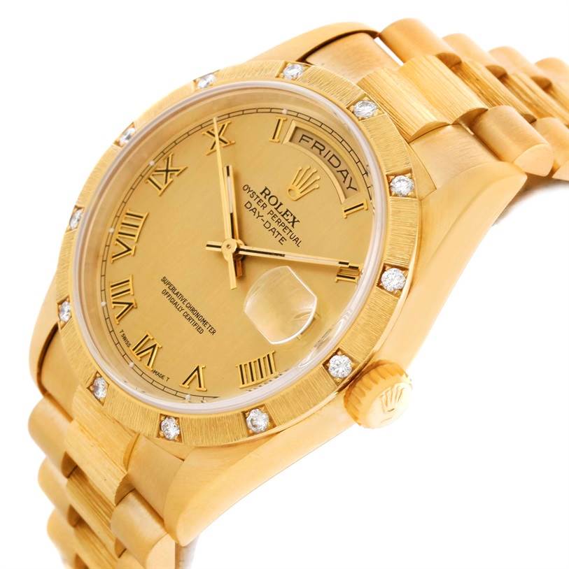 This image shows a close-up angle of the Rolex President 18308 Men
s Yellow Gold Champagne Dial 18308 Men
s Yellow Gold Champagne Dial watch, highlighting its gold dial, Roman numerals, day-date feature, and diamond bezel.
