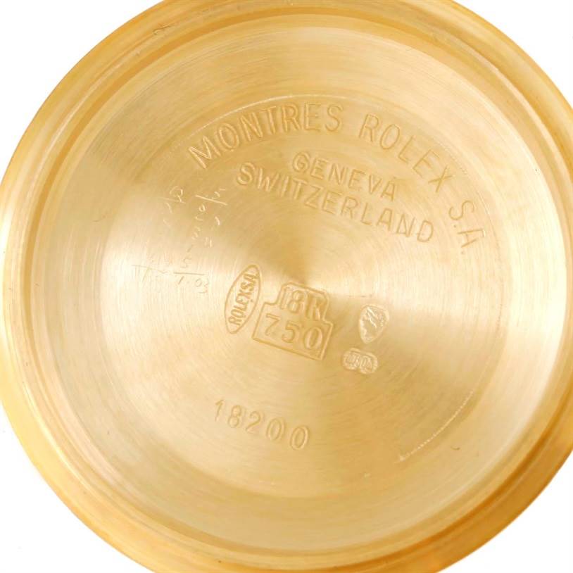 The image shows the inside of the case back of a Rolex President 18308 Men
s Yellow Gold Champagne Dial 18308 Men
s Yellow Gold Champagne Dial watch, engraved with branding and specifications.