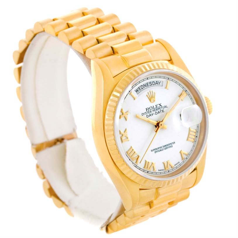 The image shows a side and partial front view of a Rolex President 18038 Men's Yellow Gold White Dial 18038 Men's Yellow Gold White Dial model watch, showcasing its gold bracelet, case, and dial.