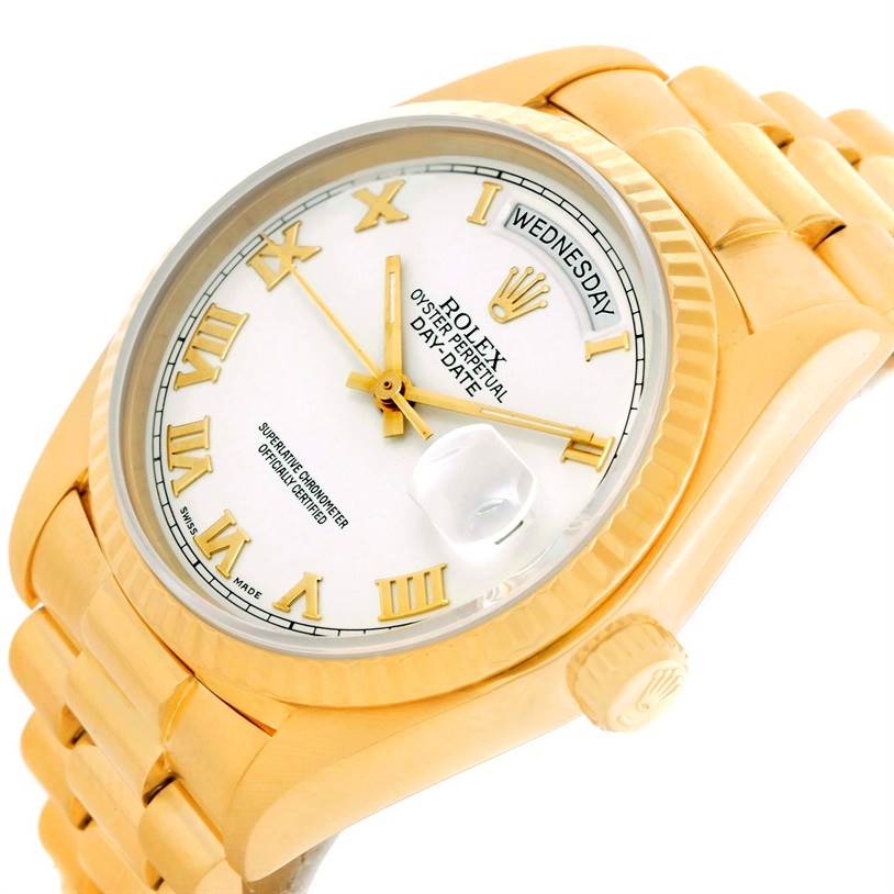 This image shows a Rolex President 18038 Men's Yellow Gold White Dial 18038 Men's Yellow Gold White Dial model watch at an angle, highlighting its gold case, white dial, and gold Roman numerals.