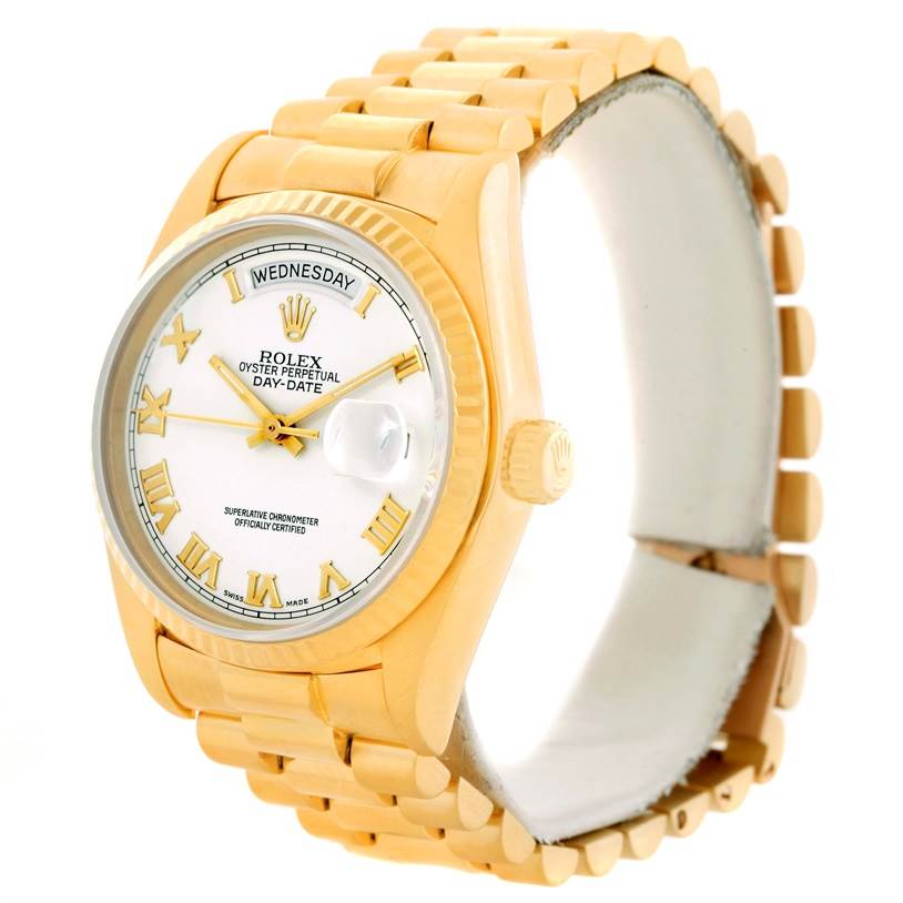 This image shows a frontal side angle of a Rolex President 18038 Men's Yellow Gold White Dial 18038 Men's Yellow Gold White Dial watch, revealing the dial, bezel, case, and part of the bracelet.