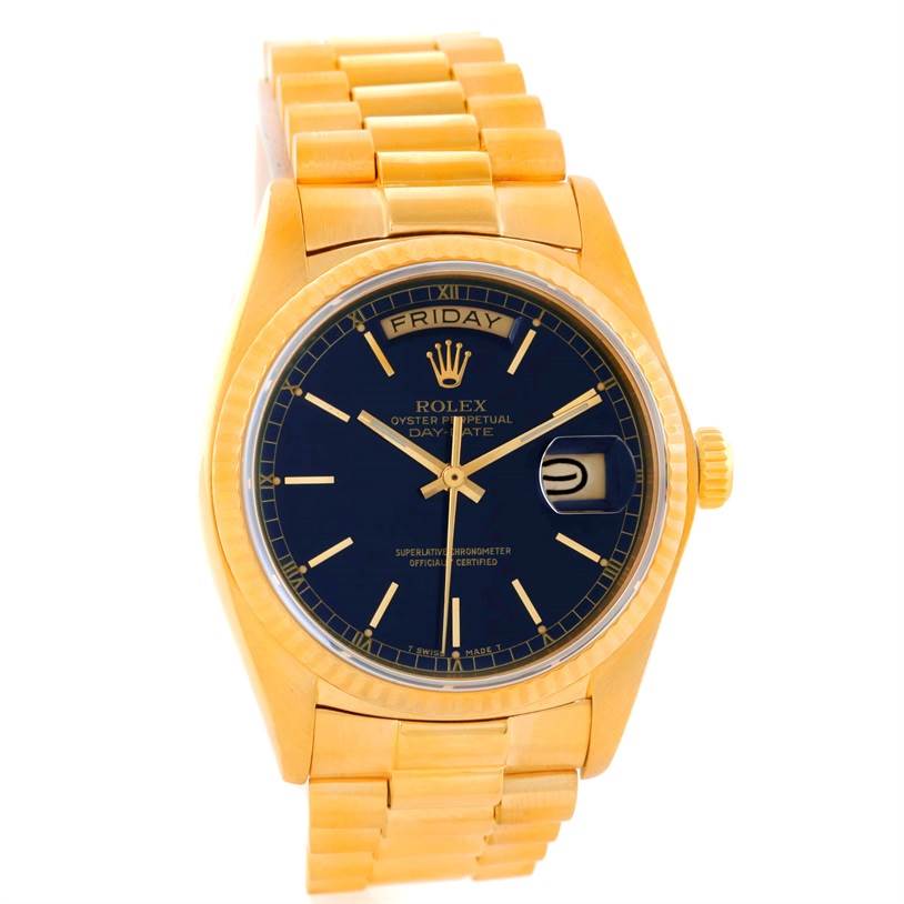 The image shows a front view of a Rolex President 18038 Men's Yellow Gold Blue Dial 18038 Men's Yellow Gold Blue Dial model watch, featuring a gold band and a black dial with day and date indicators.