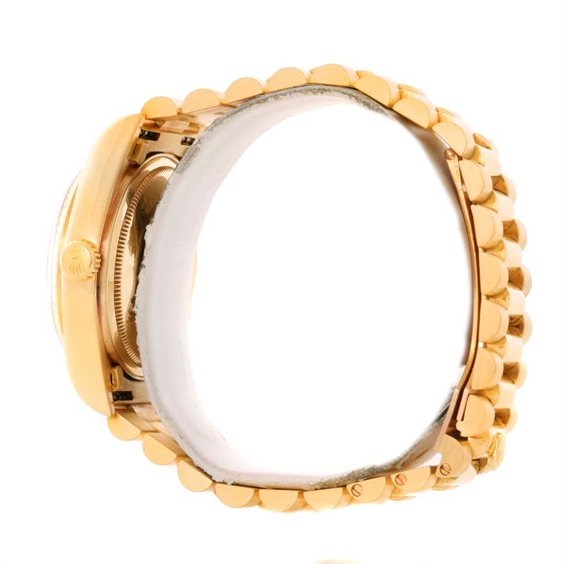 This image shows a side view of the band and casing of a Rolex President 18038 Men
s Yellow Gold Champagne Dial 18038 Men
s Yellow Gold Champagne Dial model watch.