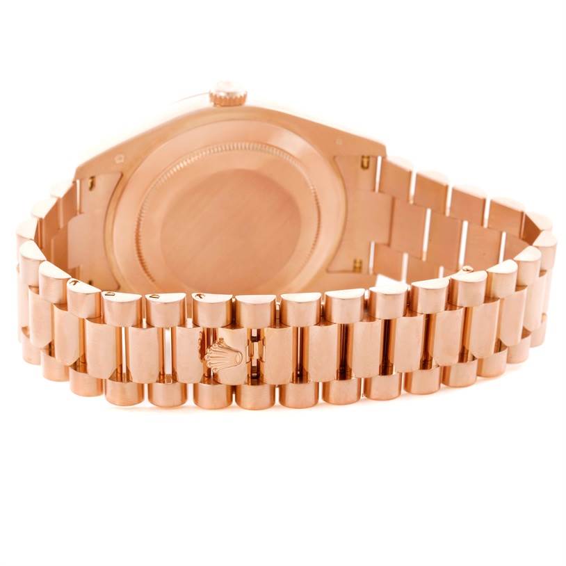 The image shows the back view of a Rolex President 218235 Men's Rose Gold Beige Dial 218235 Men's Rose Gold Beige Dial model watch, focusing on the case back and bracelet.