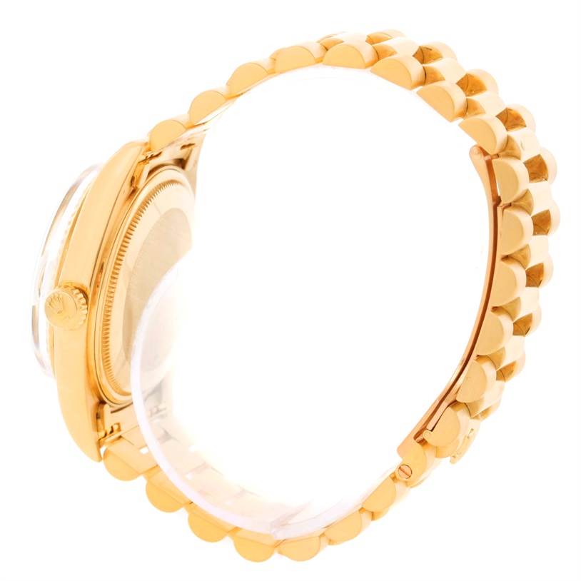 The image shows a side view of a Rolex President 1803 Men
s Yellow Gold Champagne Dial 1803 Men
s Yellow Gold Champagne Dial model watch, focusing on the case, crown, and part of the bracelet.