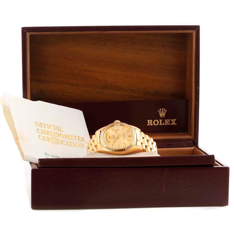 The Rolex President 1803 Men
s Yellow Gold Champagne Dial 1803 Men
s Yellow Gold Champagne Dial watch is shown from the front in its open box, accompanied by an official chronometer certification document.