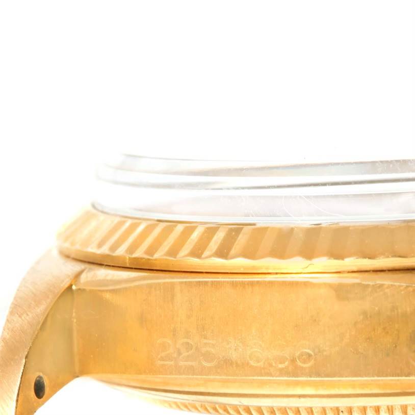 This image shows a close-up side view of a Rolex President 1803 Men
s Yellow Gold Champagne Dial 1803 Men
s Yellow Gold Champagne Dial model, highlighting the case and part of the bezel.