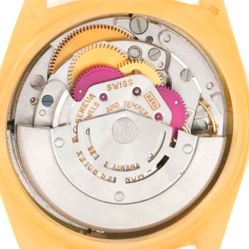 This is a close-up view of the internal mechanism of a Rolex President 1803 Men
s Yellow Gold Champagne Dial 1803 Men
s Yellow Gold Champagne Dial model watch, showing gears and movement parts.