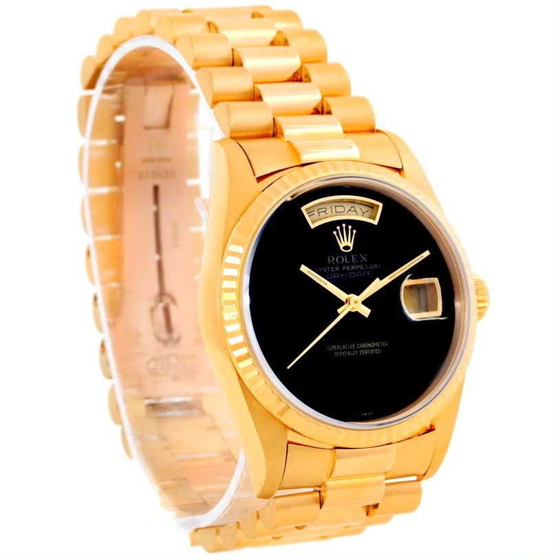 This image shows a Rolex President 18238 Men
s Yellow Gold Champagne Dial 18238 Men
s Yellow Gold Champagne Dial model watch from a front-side angle, displaying the black dial, day-date complication, and gold bracelet.