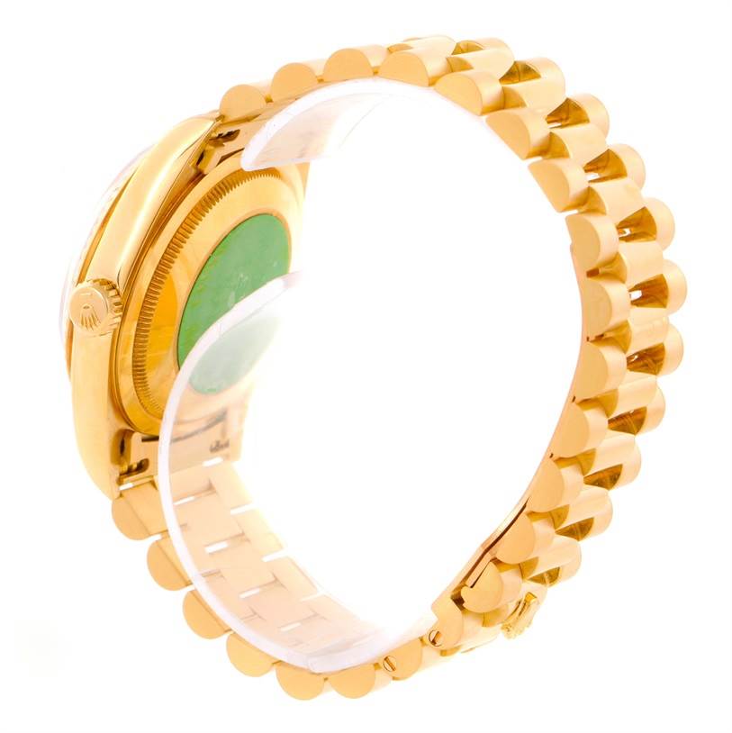 The image shows the side view and partial back of a Rolex President 18238 Men
s Yellow Gold Champagne Dial 18238 Men
s Yellow Gold Champagne Dial model watch, highlighting its gold case and bracelet.