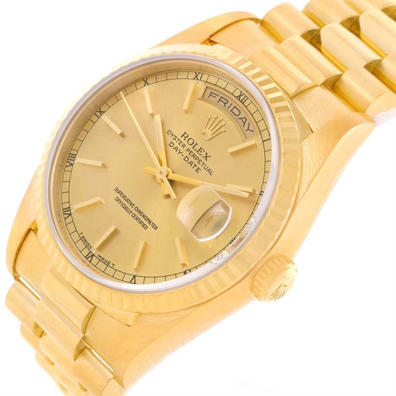 The image shows a close-up view of a Rolex President 18238 Men
s Yellow Gold Champagne Dial 18238 Men
s Yellow Gold Champagne Dial model watch, highlighting the dial, bezel, and part of the bracelet.