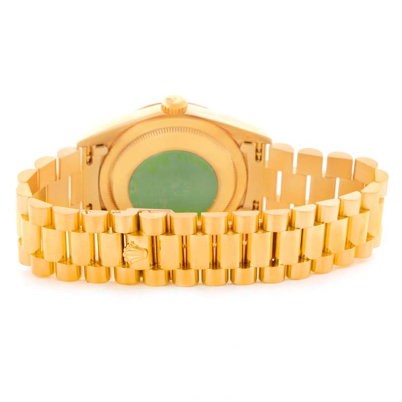 The image shows a rear view of the Rolex President 18238 Men
s Yellow Gold Champagne Dial 18238 Men
s Yellow Gold Champagne Dial model watch, focusing on the bracelet and case back.