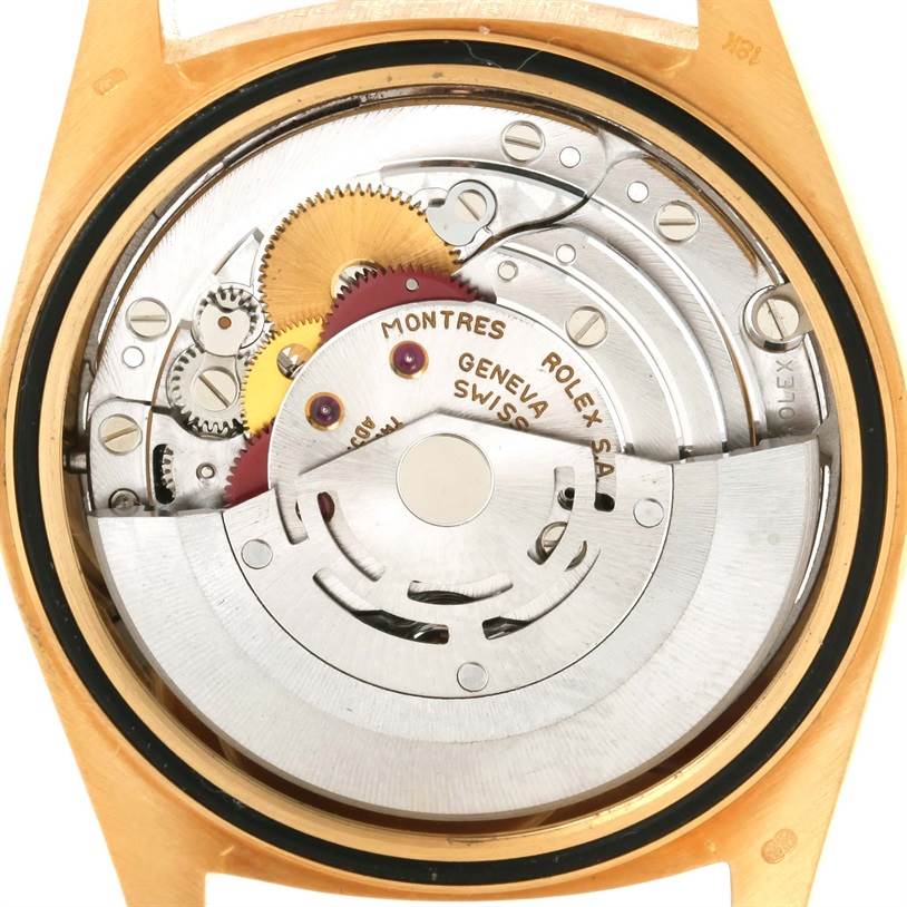This image shows the movement and internal components of a Rolex President 18248 Men's Yellow Gold White Dial 18248 Men's Yellow Gold White Dial model from a rear angle with the case back removed.