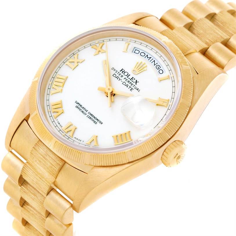 The image shows a close-up angle of the Rolex President 18248 Men's Yellow Gold White Dial 18248 Men's Yellow Gold White Dial model watch, highlighting the face, crown, and bracelet.