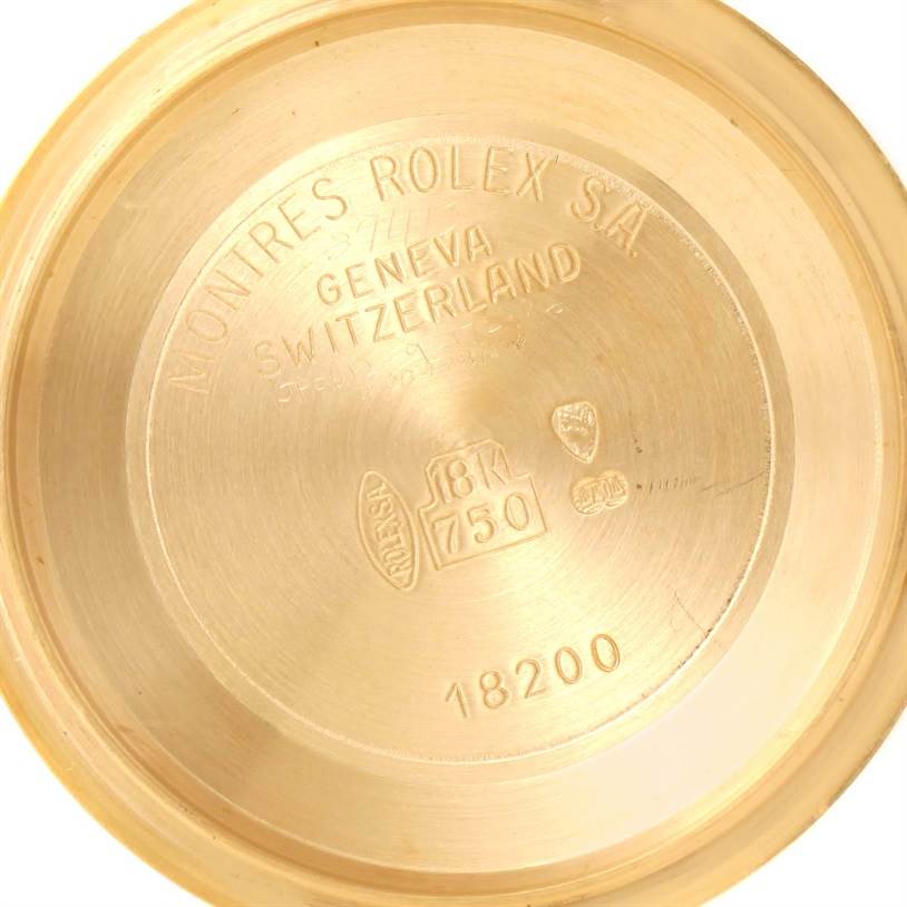 This is the inner back cover of a Rolex President 18248 Men
s Yellow Gold Champagne Dial 18248 Men
s Yellow Gold Champagne Dial model, showing its gold content and certification.