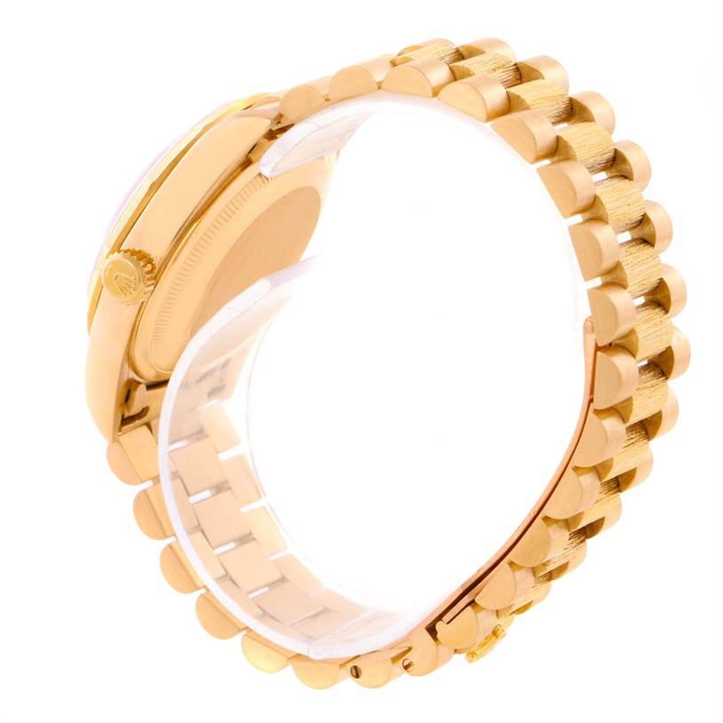 This image shows the side view of the gold bracelet and case back of a Rolex President 18248 Men
s Yellow Gold Champagne Dial 18248 Men
s Yellow Gold Champagne Dial model watch.