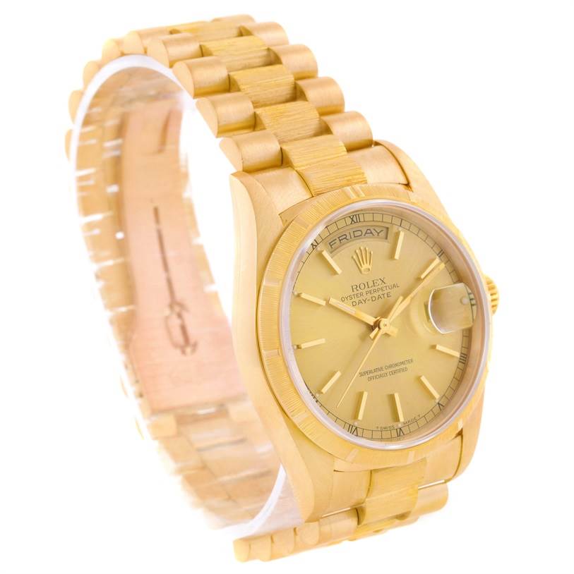 This image shows a Rolex President 18248 Men
s Yellow Gold Champagne Dial 18248 Men
s Yellow Gold Champagne Dial model watch at a slight angle, highlighting its gold bracelet, dial, and day-date features.