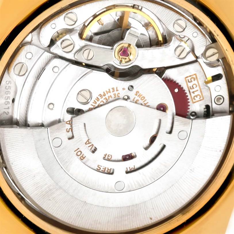 This is a close-up view of the movement inside a Rolex President 18348 Men
s Yellow Gold Champagne Dial 18348 Men
s Yellow Gold Champagne Dial watch, showcasing intricate internal components.