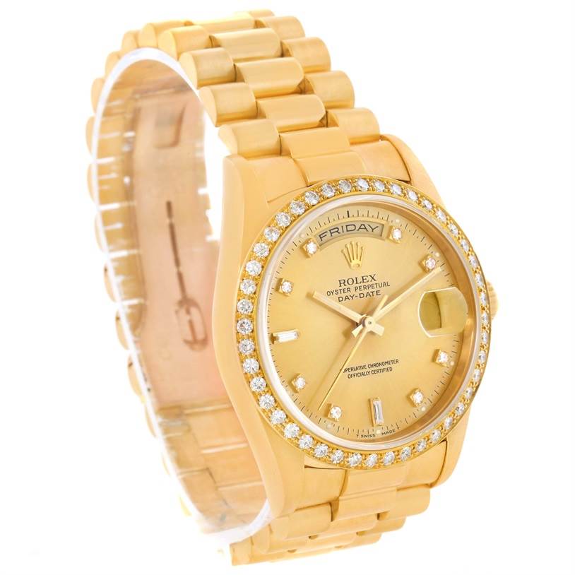 The image shows a Rolex President 18348 Men
s Yellow Gold Champagne Dial 18348 Men
s Yellow Gold Champagne Dial model watch at an angle highlighting the diamond-studded bezel, day-date display, and gold bracelet.