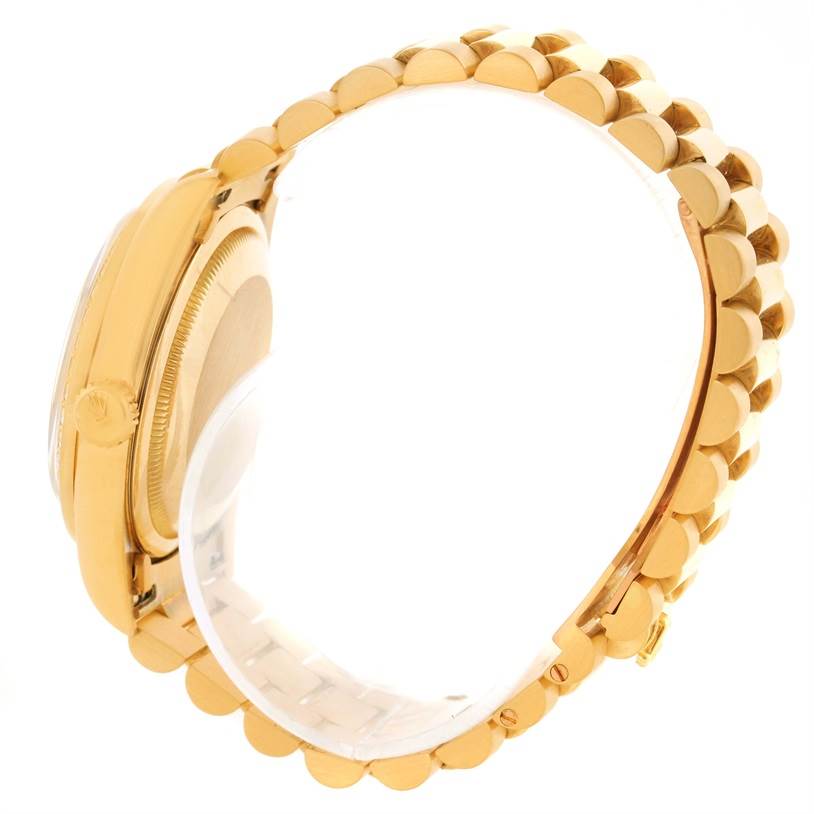 This image shows a side view of the Rolex President 18348 Men
s Yellow Gold Champagne Dial 18348 Men
s Yellow Gold Champagne Dial model, highlighting the gold case and bracelet.