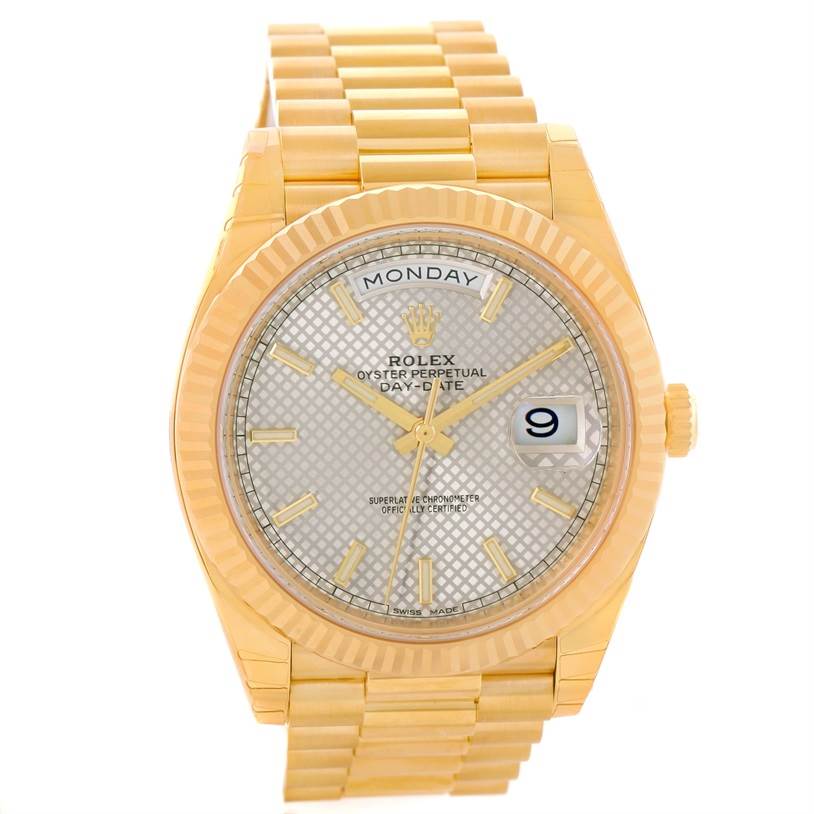 A Rolex President 228238 Men's Yellow Gold Silver Dial 228238 Men's Yellow Gold Silver Dial model watch is shown from a front angle, displaying its face, bezel, and bracelet.