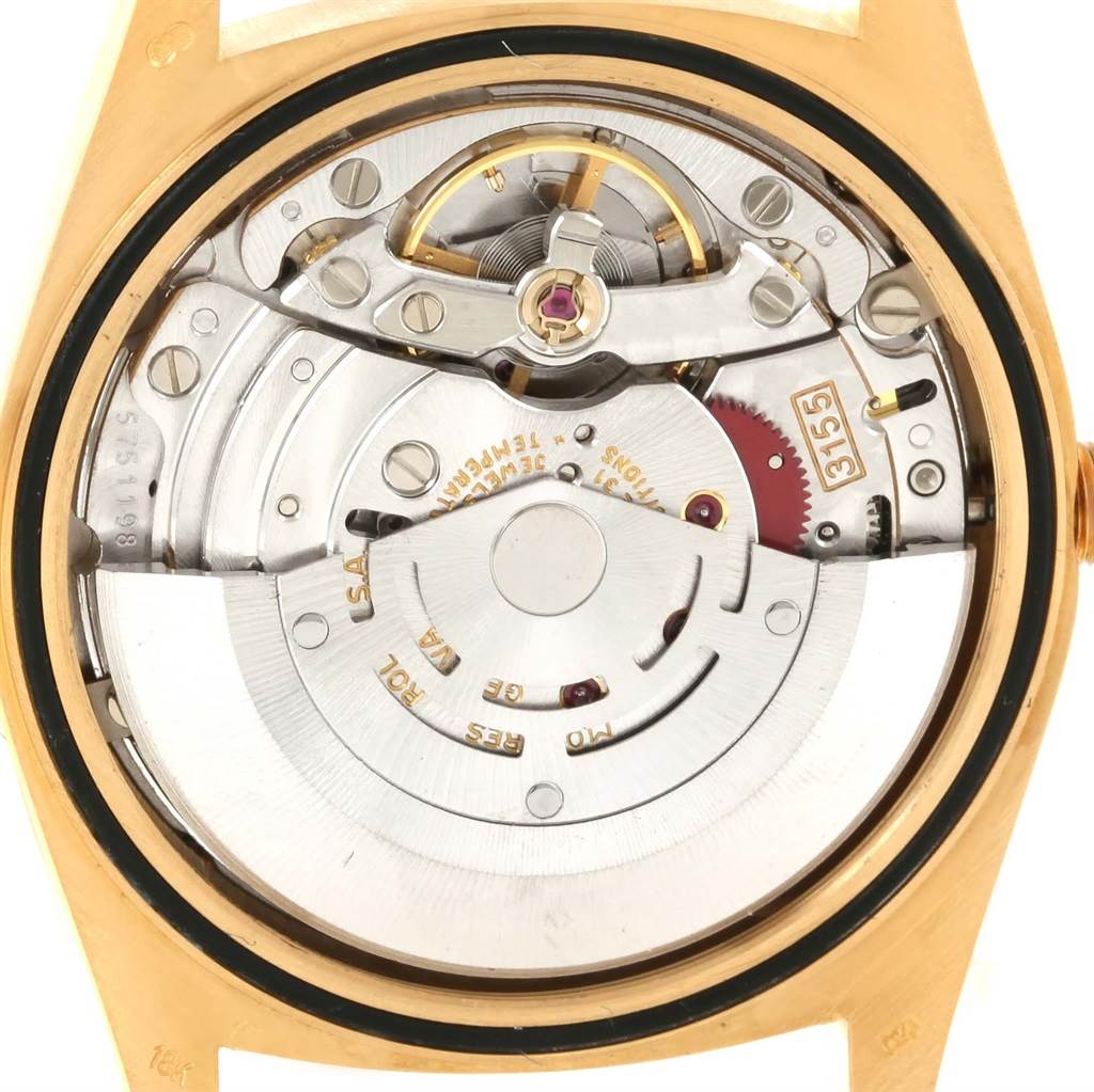 The image shows the movement and internal mechanism of a Rolex President 18248 Men
s Yellow Gold Champagne Dial 18248 Men
s Yellow Gold Champagne Dial model watch viewed from the back.