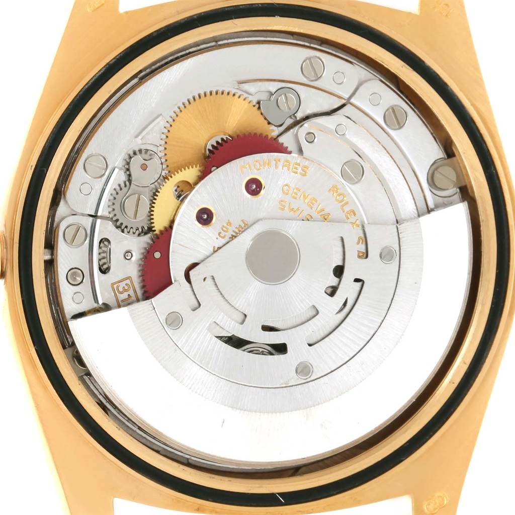 This image shows the internal mechanism of a Rolex President 18248 Men
s Yellow Gold Champagne Dial 18248 Men
s Yellow Gold Champagne Dial watch from a rear angle, highlighting its intricate gears and rotor.