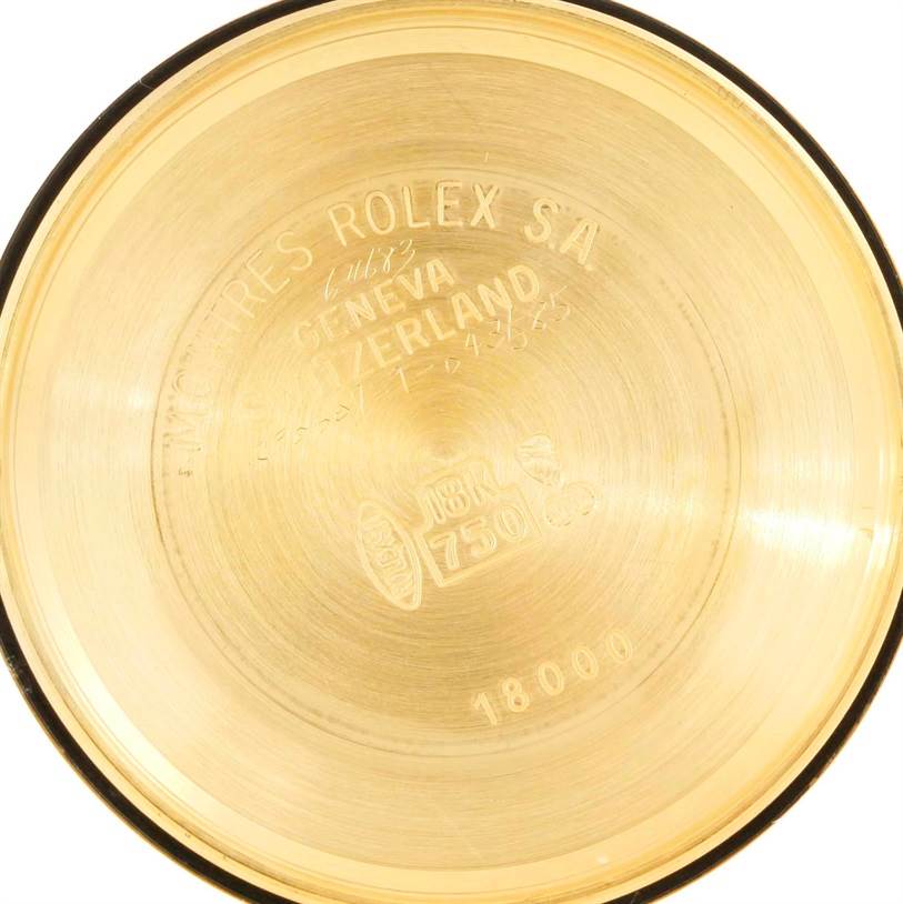 This image shows the interior case back of a Rolex President 18038 Men
s Yellow Gold Mother of Pearl Dial 18038 Men
s Yellow Gold Mother of Pearl Dial model watch, highlighting engravings and hallmarks.