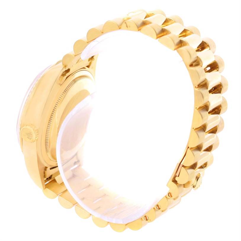 This image shows the side and back of a Rolex President 18038 Men
s Yellow Gold Mother of Pearl Dial 18038 Men
s Yellow Gold Mother of Pearl Dial model watch, particularly highlighting the gold bracelet and case.