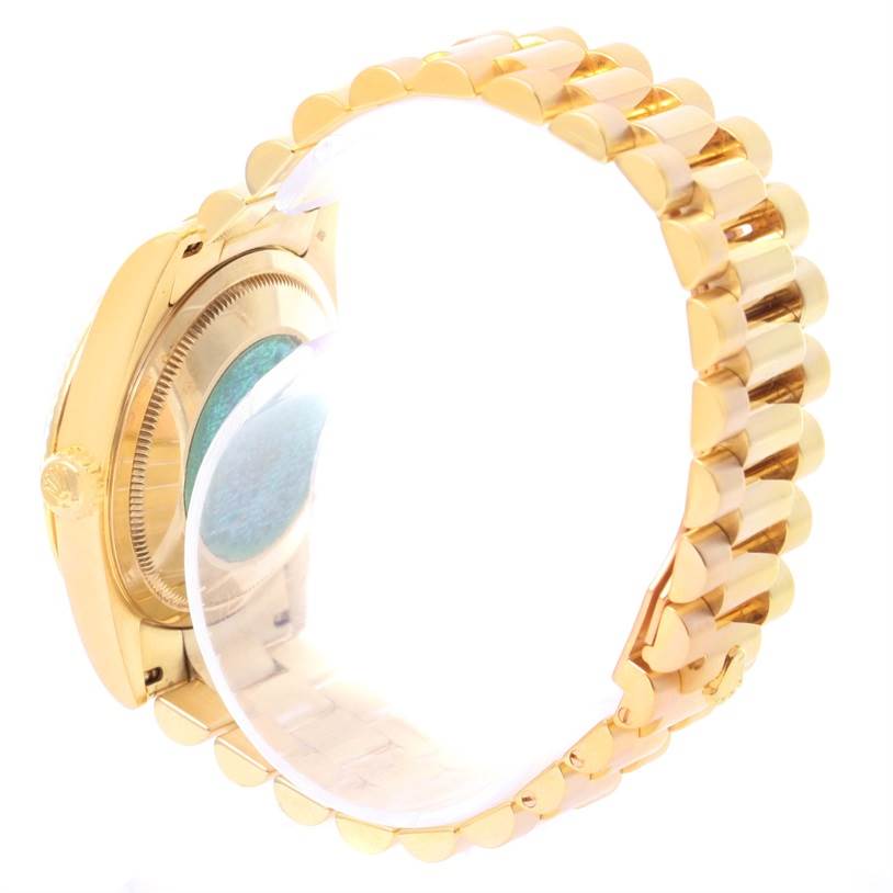 The image shows a side view of the Rolex President 118238 Men
s Yellow Gold Black Dial 118238 Men
s Yellow Gold Black Dial watch, highlighting the gold bracelet and watch case.