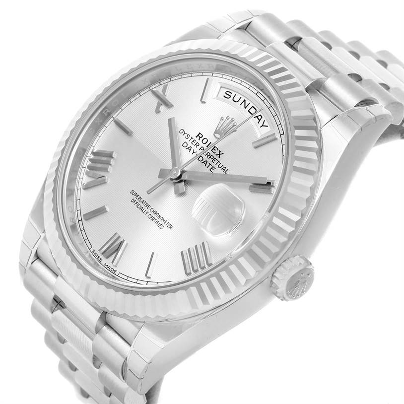 The image shows a close-up, angled view of the Rolex President 228239 Men's White Gold Silver Dial 228239 Men's White Gold Silver Dial watch's face, bezel, and bracelet.