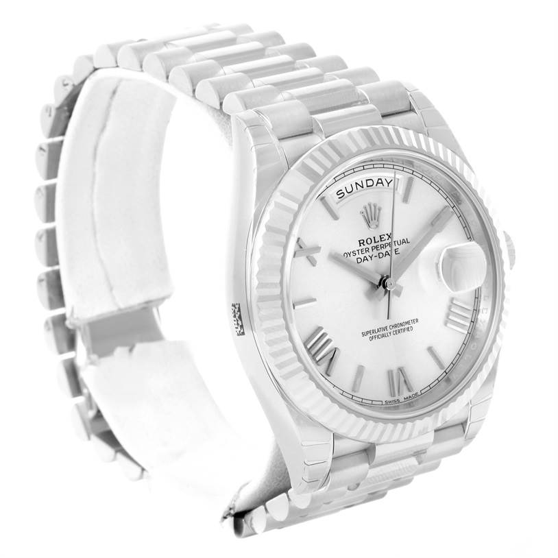 The image shows a Rolex President 228239 Men's White Gold Silver Dial 228239 Men's White Gold Silver Dial model watch angled to display the dial, fluted bezel, and part of the bracelet.