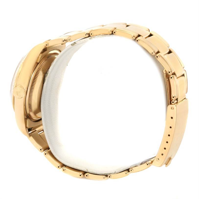 The image shows a side view of the Rolex President 15238 Men
s Yellow Gold Silver Dial 15238 Men
s Yellow Gold Silver Dial model watch, highlighting its gold bracelet and case.