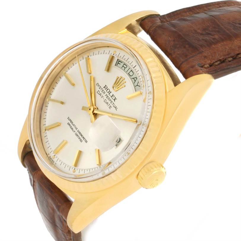 The Rolex President 1803 Men
s Yellow Gold Silver Dial 1803 Men
s Yellow Gold Silver Dial model watch is shown at a slight angle, highlighting the dial, crown, and leather strap.