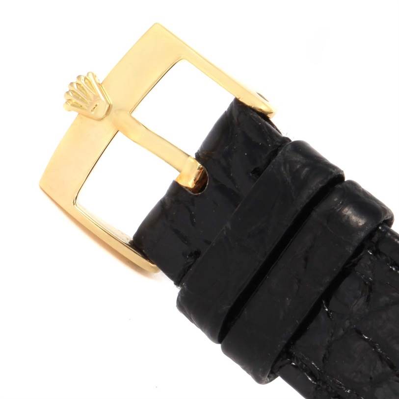 The image shows a close-up of the buckle and strap of a Rolex President 18038 Men
s Yellow Gold Champagne Dial 18038 Men
s Yellow Gold Champagne Dial model watch.