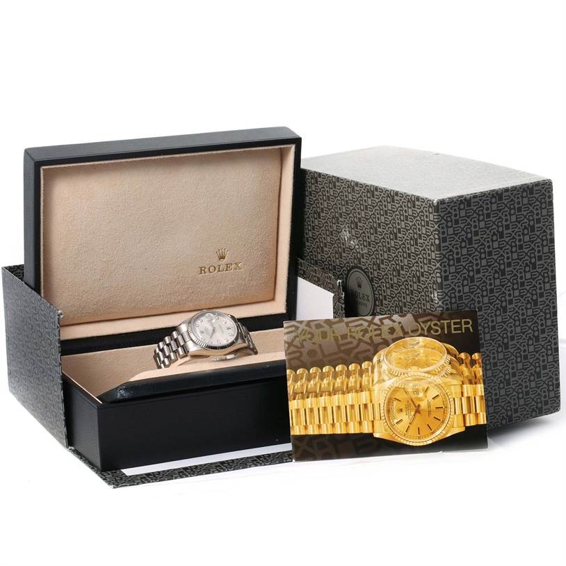 The image shows a Rolex President 118239 Men's White Gold Silver Dial 118239 Men's White Gold Silver Dial model watch inside its opened box, with the outer box and an Oyster booklet displayed.