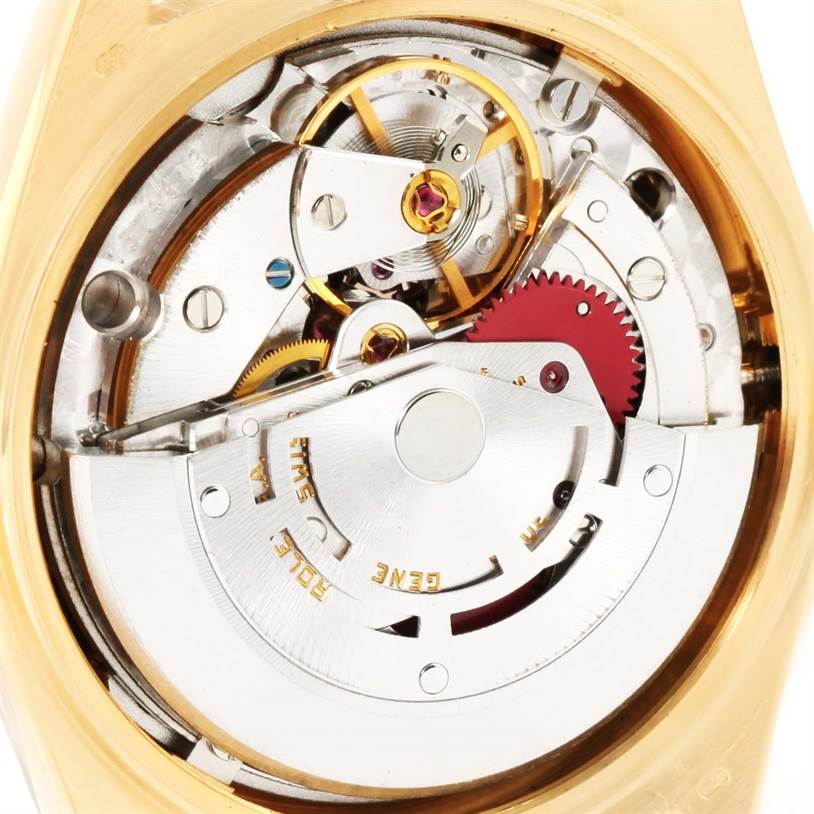 This is a close-up view of the internal mechanism of a Rolex President 18138 Men
s Yellow Gold Silver Dial 18138 Men
s Yellow Gold Silver Dial watch model, showcasing gears and intricate components.