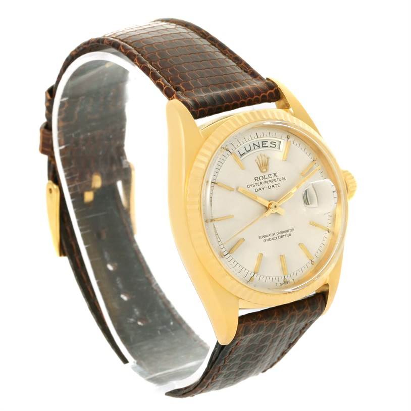The image shows a Rolex President 1803 Men
s Yellow Gold Silver Dial 1803 Men
s Yellow Gold Silver Dial model watch at an angled side view, highlighting the gold case, brown leather strap, and dial.