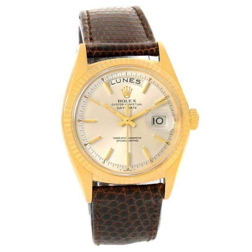 This Rolex President 1803 Men
s Yellow Gold Silver Dial 1803 Men
s Yellow Gold Silver Dial model watch is shown from a top-down angle, featuring the gold case, dial, bezel, and brown leather strap.