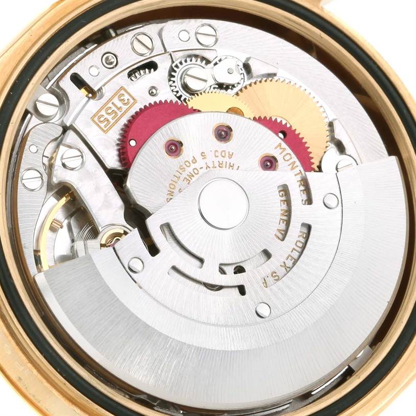This image shows the internal mechanism and components of a Rolex President 118208 Men
s Yellow Gold White Dial 118208 Men
s Yellow Gold White Dial model watch from a top-down angle.