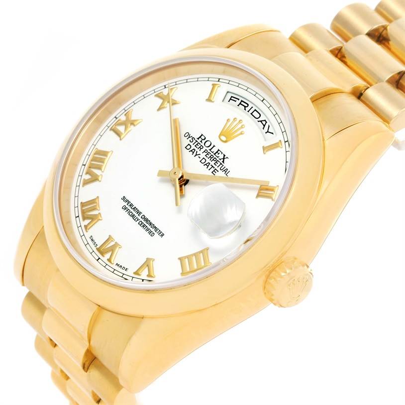 This image shows a Rolex President 118208 Men
s Yellow Gold White Dial 118208 Men
s Yellow Gold White Dial model watch from an angled perspective, highlighting the face, crown, and part of the bracelet.