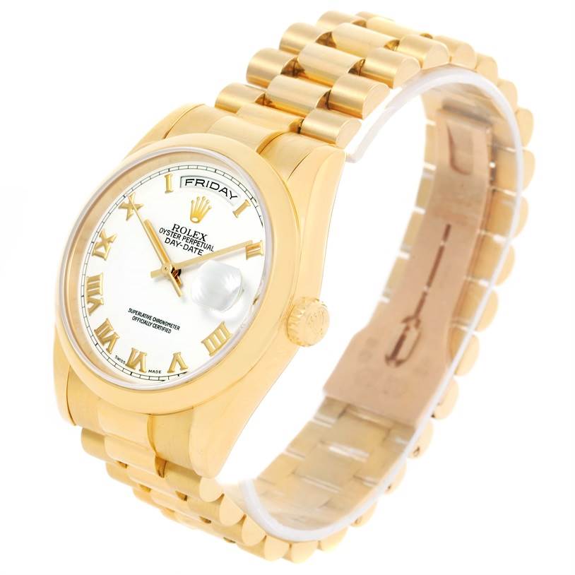 This image shows the Rolex President 118208 Men
s Yellow Gold White Dial 118208 Men
s Yellow Gold White Dial model watch from a front-side angle, highlighting the face, crown, and bracelet.