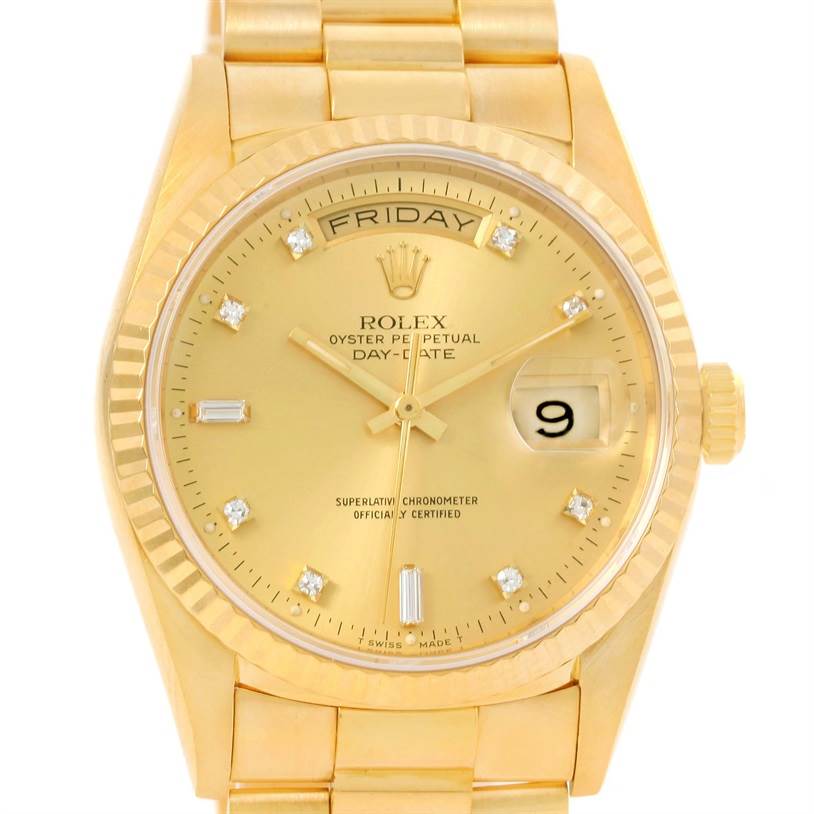 This image shows a frontal view of the Rolex President 18238 Men
s Yellow Gold Champagne Dial 18238 Men
s Yellow Gold Champagne Dial model, displaying its gold dial, day-date feature, and diamond hour markers.