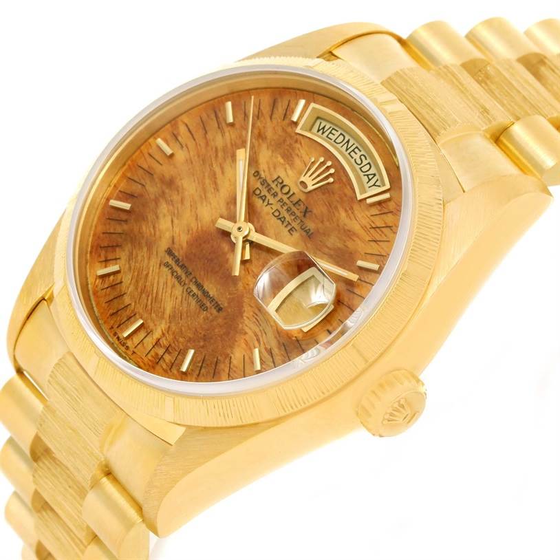 The Rolex President 18078 Men's Yellow Gold Brown Dial 18078 Men's Yellow Gold Brown Dial model is shown from a front angled view, highlighting the dial, day-date display, and part of the bracelet.