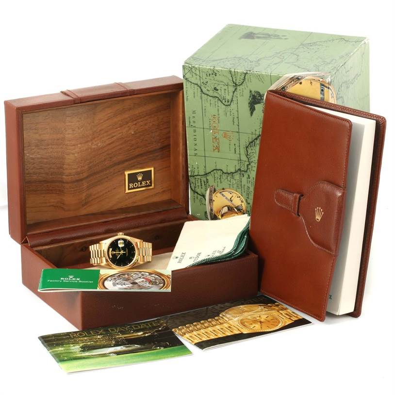 The image shows a Rolex President 18238 Men's Yellow Gold Black Dial 18238 Men's Yellow Gold Black Dial model watch, its box, warranty card, manuals, and leather holder from a front angle.