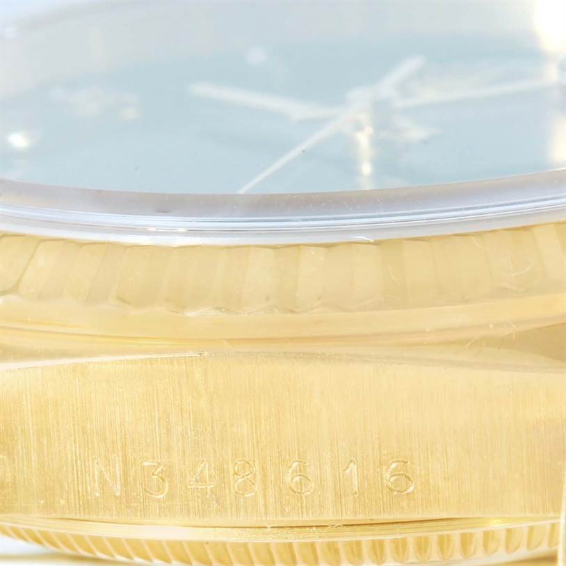 The image shows a close-up of the Rolex President 18238 Men's Yellow Gold Black Dial 18238 Men's Yellow Gold Black Dial model watch, focusing on the side with serial number N348616.