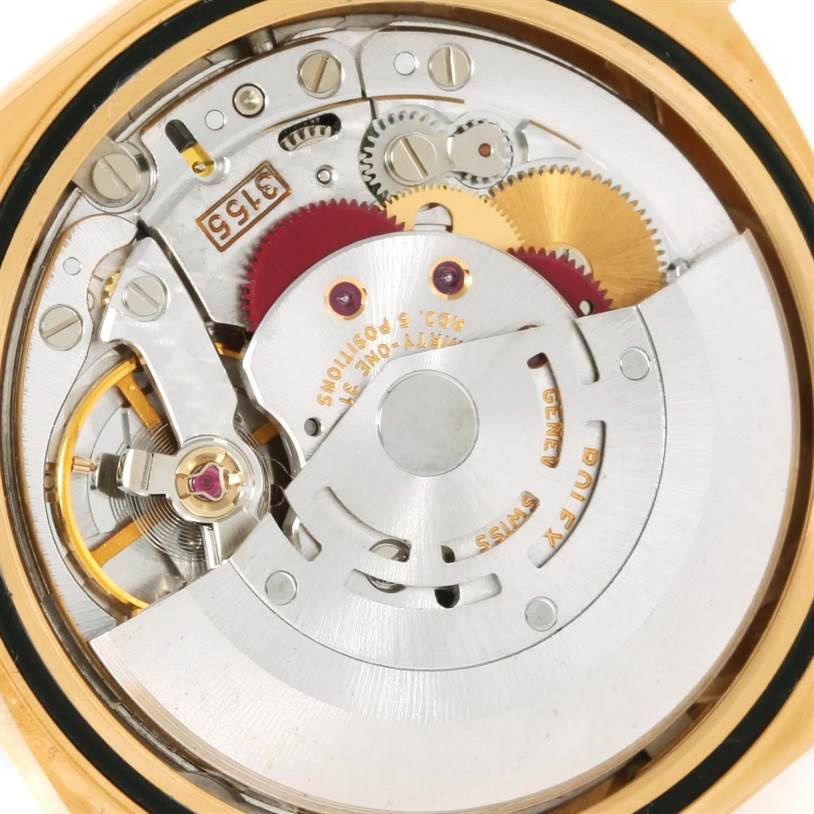 The image shows the internal movement components of a Rolex President 18238 Men
s Yellow Gold Champagne Dial 18238 Men
s Yellow Gold Champagne Dial model watch from a close-up, top-down angle.