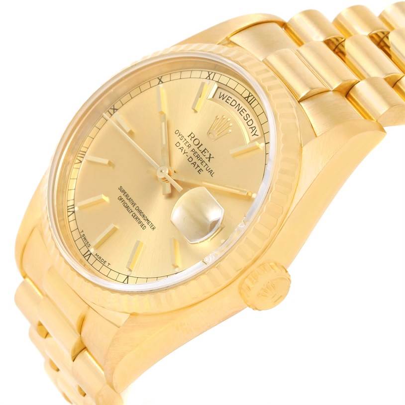This image shows a side angle of a Rolex President 18238 Men
s Yellow Gold Champagne Dial 18238 Men
s Yellow Gold Champagne Dial model watch, highlighting its face, crown, and bracelet.
